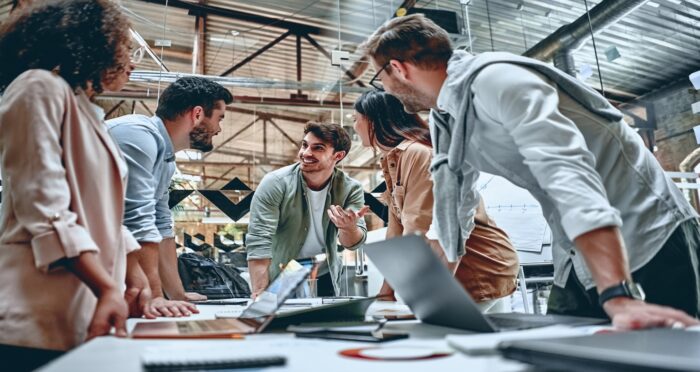 Business team collaborating to align IT support, managed IT, and execution for growth